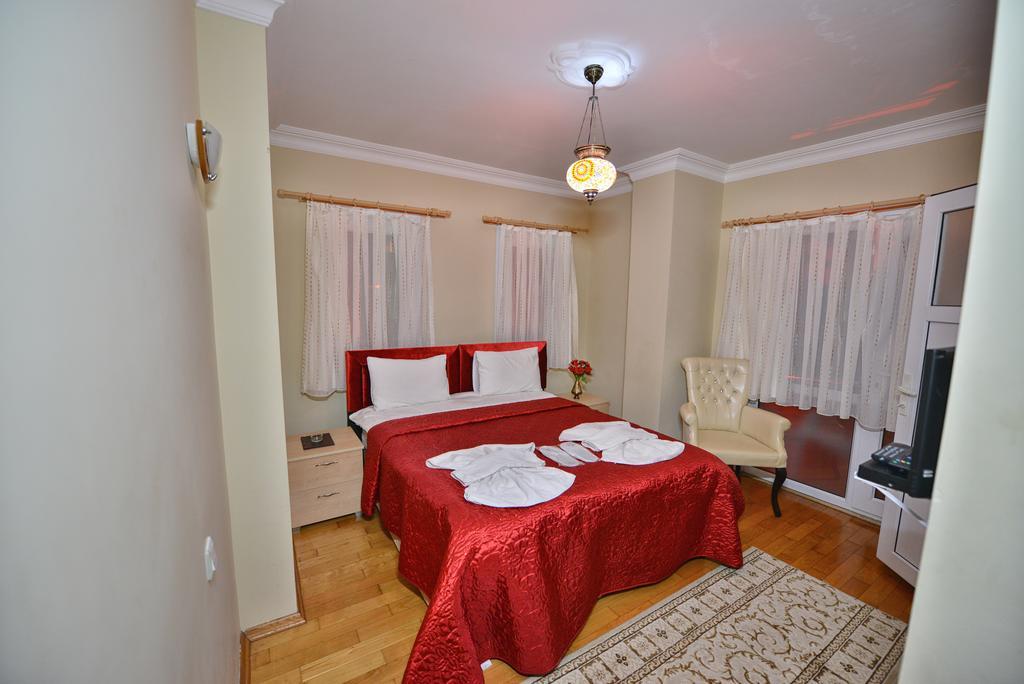 Assortie La Villa Hotel Ава Стая снимка